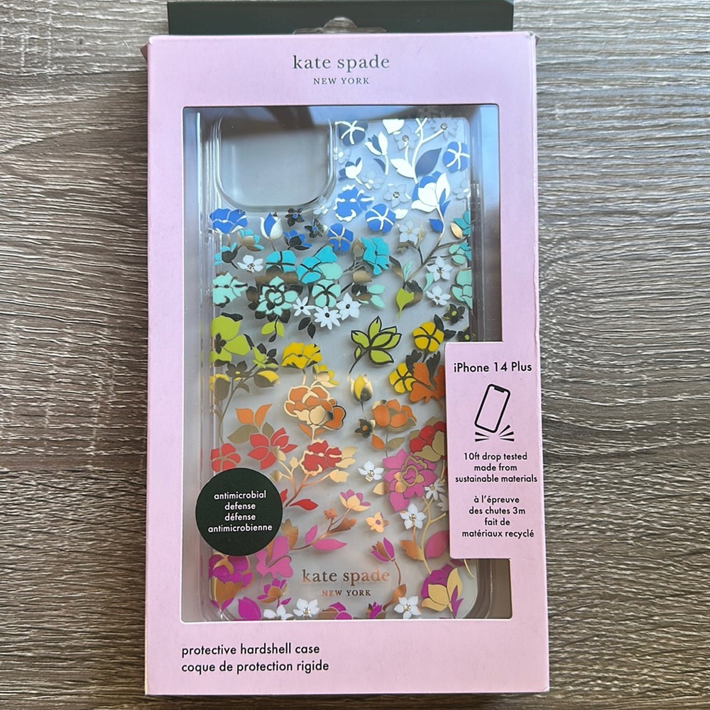 Kate Spade iPhone 14 Plus. BNIB. Clear with colorful floral design.